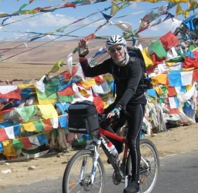 Chris Darke  Cycling on the  tour with redspokes